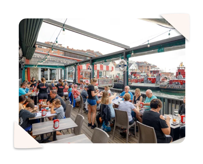 Guests enjoying a Portsmouth waterfront deck
