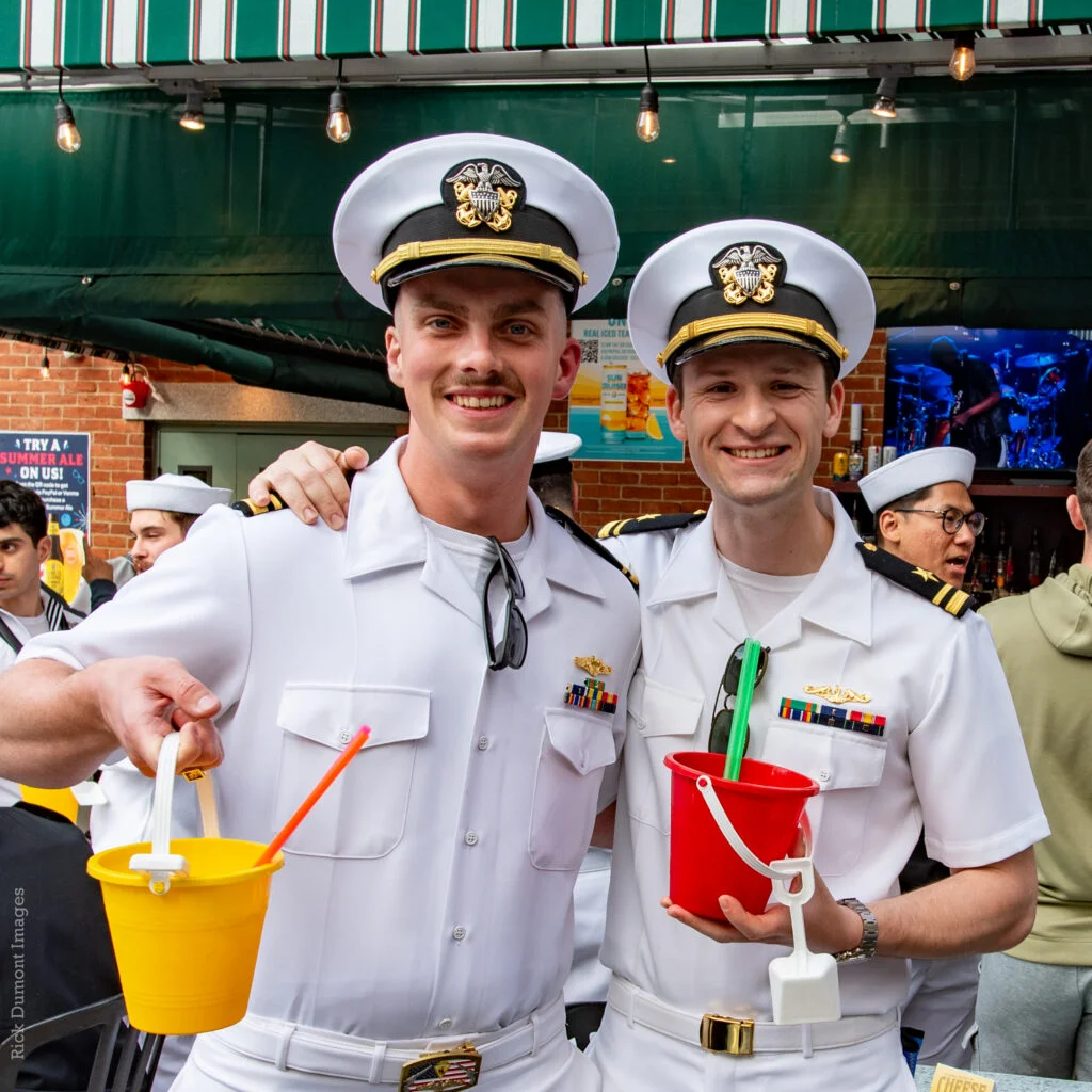 Guests holding drinks at Hit the Decks 2024
